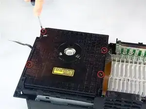 Limpieza de la lente de la unidad óptica de una PlayStation 2