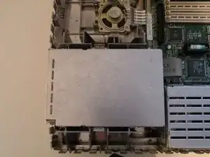 Desmontando la disquetera de Macintosh IIsi