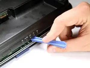 Desmontaje de los ensamblajes superior e inferior de Toshiba Satellite A65-S126