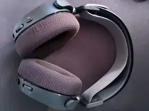 Cómo desalojar o realinear el dial/control deslizante de volumen atascado de un Arctis 7+
