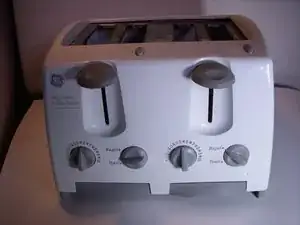 Reparación de tostador con opción para bagels General Electric Switch 4 rebanadas