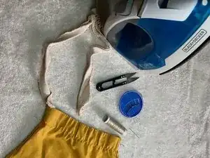 Cómo volver a colocar la tira de un delantal