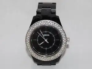 Reloj analógico Glitz de Fossil con pulsera de resina negra para mujer