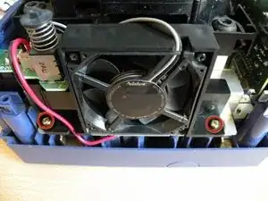 Retirar el Conjunto de la Unidad Óptica de Nintendo GameCube