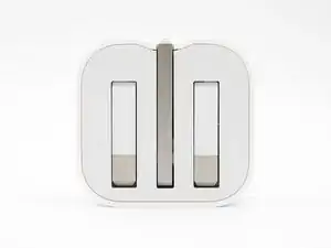 Reparación de adaptador de corriente USB Apple 5W  (clavijas plegables - tipo UK)