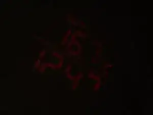 Reparación del proyector de un reloj despertador