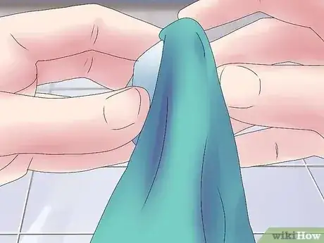 صورة عنوانها Remove a Security Tag from Clothing Step 14