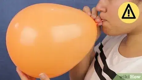 صورة عنوانها Blow Up a Balloon Step 7