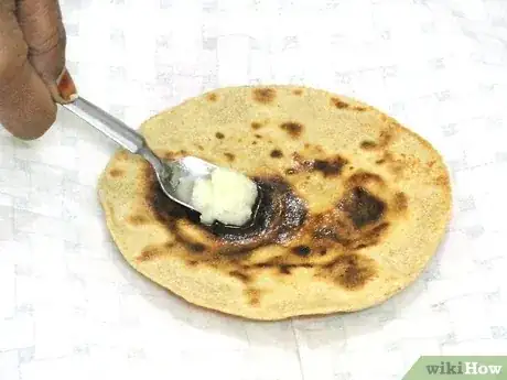 Gambar berjudul Make Roti Step 14
