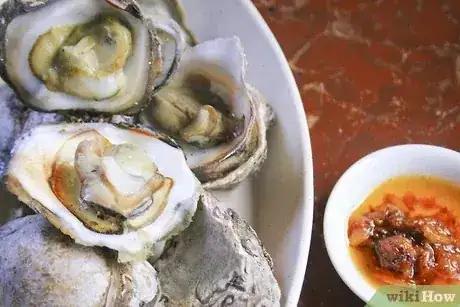 Gambar berjudul Cook Oysters Step 10