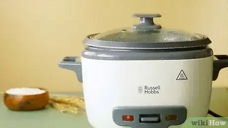 Gambar berjudul Cook Rice in a Rice Cooker Step 9