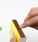 Menggunakan Korek Api