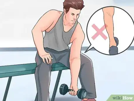 Gambar berjudul Do a Concentration Curl Step 7