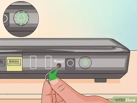 Gambar berjudul Reset a Netgear Router Step 4