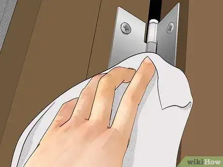 Gambar berjudul Lubricate Door Hinges Step 6
