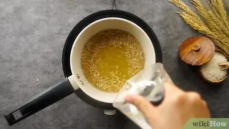 Imagem intitulada Cook Rice with Chicken Broth Step 6