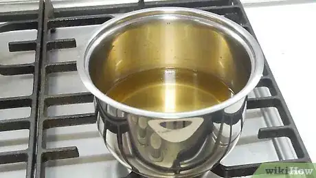 Imagem intitulada Avoid Oil Splatter when Frying Step 9
