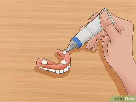 Imagem intitulada File Down Dentures Step 4