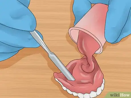 Imagem intitulada File Down Dentures Step 11