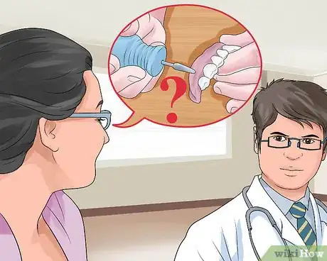 Imagem intitulada File Down Dentures Step 9