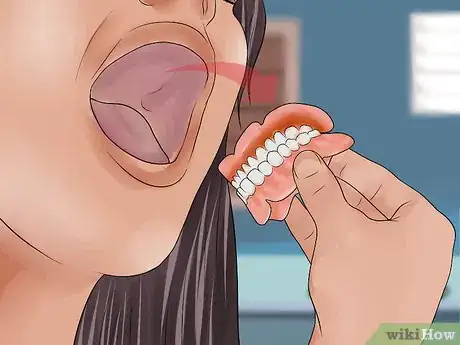 Imagem intitulada File Down Dentures Step 7