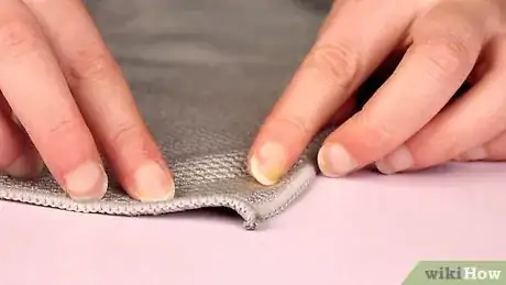 Imagem intitulada Do a Simple Coin Magic Trick Step 16