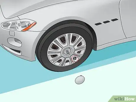 Imagem intitulada Change a Hubcap Step 13