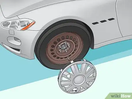 Imagem intitulada Change a Hubcap Step 17
