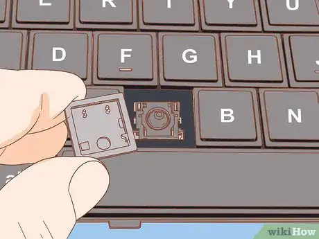 Imagem intitulada Reattach a Keyboard Key Step 1