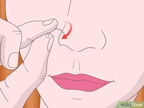 Imagem intitulada Put a Nose Ring Back In Step 3