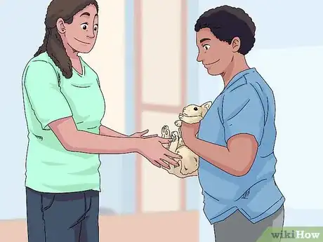 Imagem intitulada Pick up a Rabbit Step 11