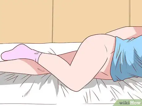 Imagem intitulada Insert a Rectal Suppository Step 7