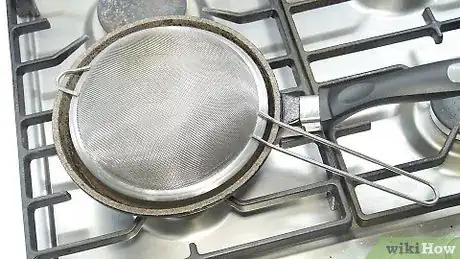 Imagem intitulada Avoid Oil Splatter when Frying Step 2