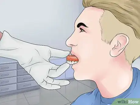 Imagem intitulada File Down Dentures Step 13